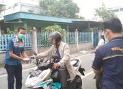 Pengurus MOI Meranti Bagikan Ribuan Masker Gratis kepengendara Dan Masyarakat