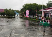Jadi Irup Penurunan Bendera HUT RI Ke-75, Kapolsek Rangsang Barat Rela Kehujanan