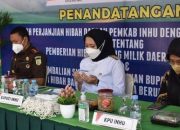 Pemkab Inhu Hibahkan Aset Tanah Pada Kejari dan Terima Hibah Thermogun Dari KPU Inhu