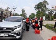 Organisasi Garda Prabowo Provinsi Riau Berbagi Berkah Ratusan SnackBox di Jalan Harapan Raya